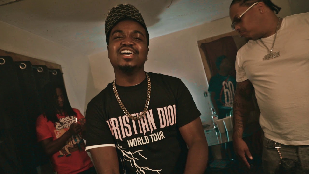 Still frame from the Pussy On Me music video by 6 Mile Rio and Ruso